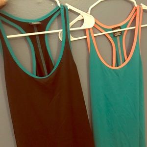 Pair of L racerbank workout tanks!